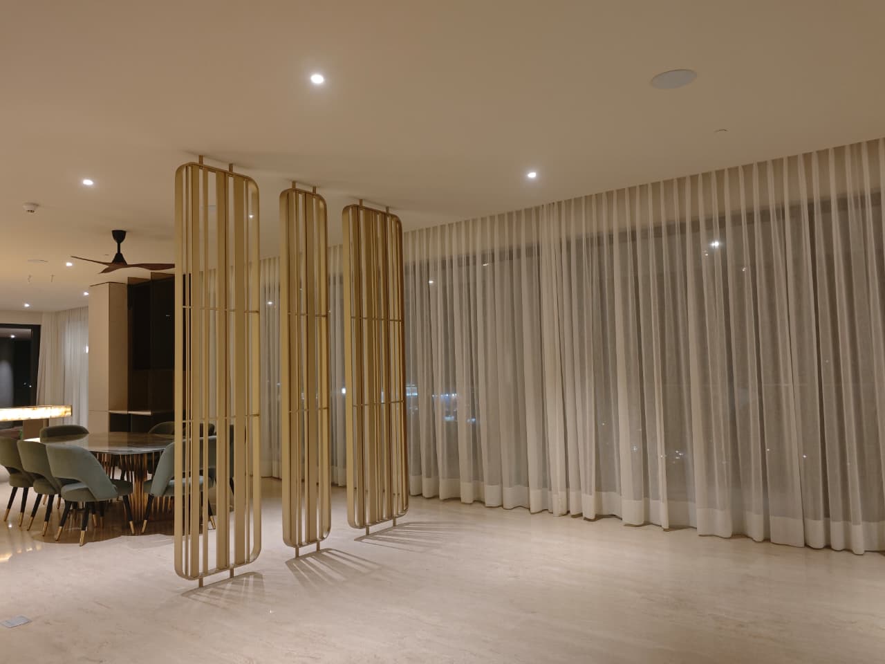 Dining with Brass Screen Partition